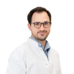 Dr. Toma Scheau